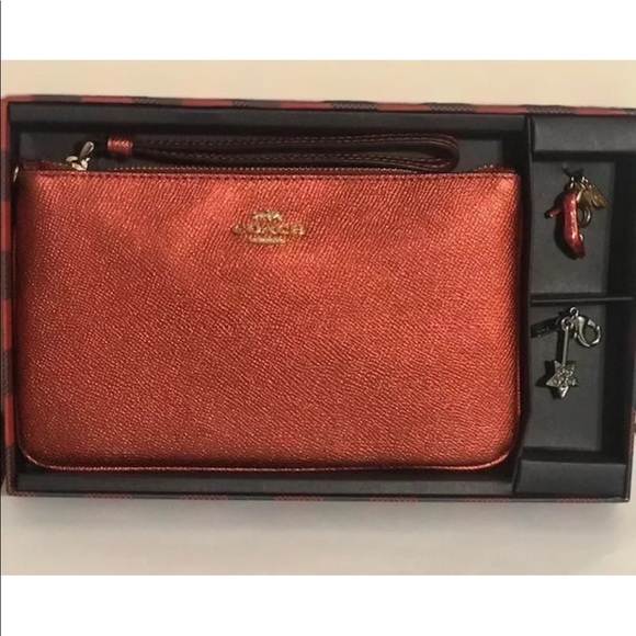 coach wizard of oz wristlet